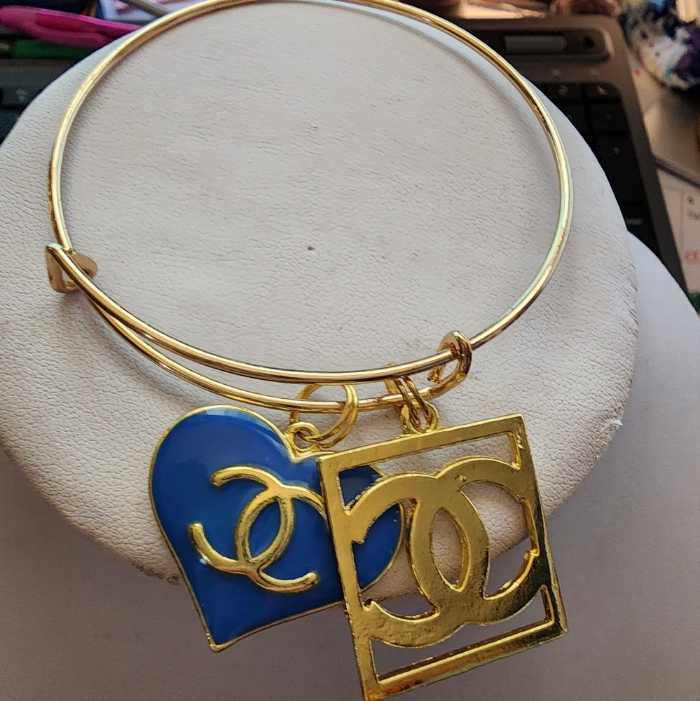 Gold Tone Bangle with Charms
